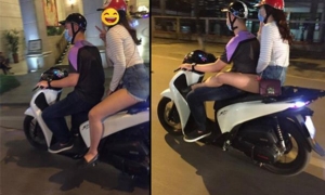 Phản cảm: Trào lưu ngồi sau xe máy gác đùi lên bạn trai Phản cảm: Trào lưu ngồi sau xe máy gác đùi lên bạn trai