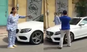 Lời phân trần của người phụ nữ cầm búa đập xe Mercedes-Benz Lời phân trần của người phụ nữ cầm búa đập xe Mercedes-Benz