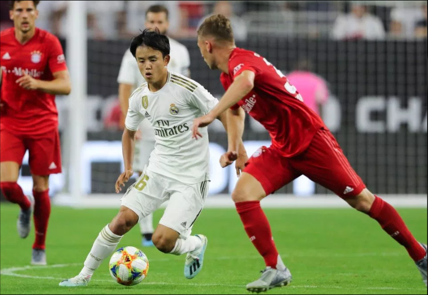 'Messi Nhật Bản' ra mắt thành công trong màu áo Real Madrid. Ảnh: The Sun Messi Nhật Bản, Kubo, Takefusa Kubo, Messi Nhật, Real Madrid, Messi Nhật Bản ra mắt Real, ICC 2019, Real vs Bayern