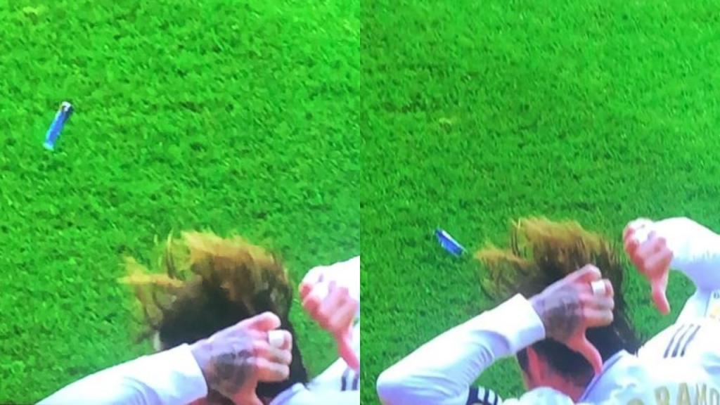 Ramos bị ném 1 chiếc bật lửa trúng người - Ảnh: BeSoccer Ramos, sao real, kết quả osasuna vs real madrid, osasuna vs real madrid, ramos phạm lỗi, ramos thẻ đỏ