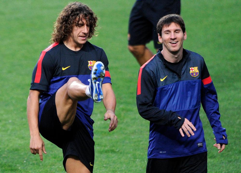 Messi và Puyol khi còn là đồng đội tại Barca. Ảnh: Getty Messi, Puyol, Barca, Barcelona, Messi Barca, Messi Barcelona