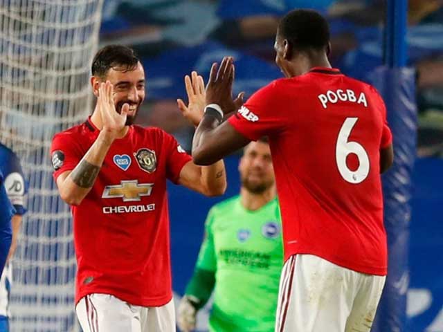 Pogba kiến tạo 'dọn cố' cho Bruno Fernandes lập công. Ảnh: Mirror Brighton 0-3 MU, Kết quả Brighton vs MU, Ngoại hạng Anh, MU, Pogba, Bruno Fernandes